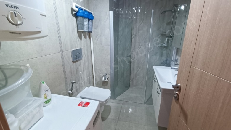 Değirmendere Mah. Kuşadası Satılık Daire |  3+1 Oda | 132M2 7.500.000Tl Eşyalı  | 4. Kat | Klima | 2 Banyo | 3 Yatak Odası Resim-5