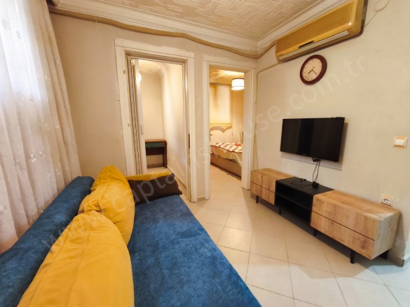 Cumhuriyet Mah. Kuşadası Satılık Daire |  1.5+1 Oda | 45M2 2.795.000Tl  Krediye Uygun  Eşyalı  | Giriş Katı | Klima | 1 Banyo | 1 Yatak Odası Resim-4