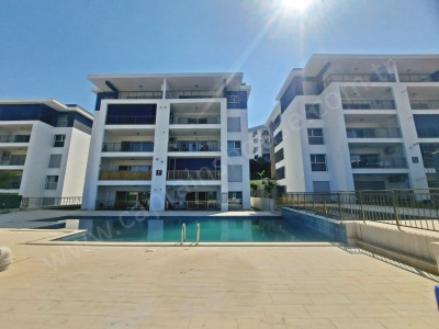 Kuşadasında Satılık Daire 3+1 Havuzlu Güvenlikli Ayrı Mutfaklı Türkmen Mah