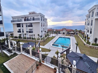Kuşadası Paşo Şükrü Sitesinde Ful Deniz Manzaralı Lüx 3+1 Satılık Daire Kadınlar Denizi Mah