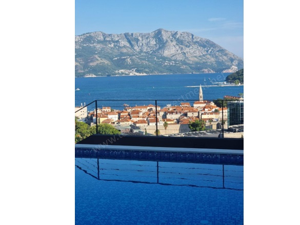 Budva Budva Satılık Daire |  1+1 Oda | 64M2 288.000€ | 1. Kat | Klima | 1 Banyo | 1 Yatak Odası Resim-1