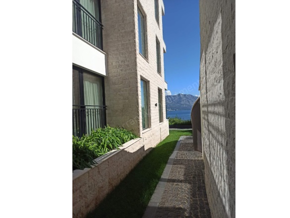 Budva Budva Satılık Daire |  1+1 Oda | 64M2 288.000€ | 1. Kat | Klima | 1 Banyo | 1 Yatak Odası Resim-4