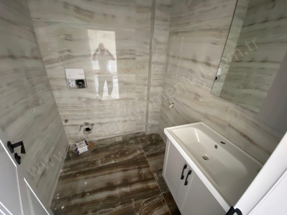 Sahil Mah-Küçükkuyu Köyü. Ayvacık Satılık Daire |  2+1 Oda | 95M2 6.500.000Tl  Krediye Uygun  | 1. Kat | Kat Kaloriferi | 2 Banyo | 2 Yatak Odası Resim-2