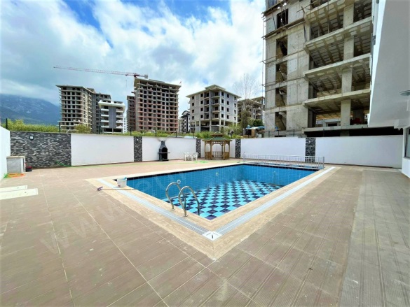 Mahmutlar Mah. Alanya Satılık Daire |  1+1 Oda | 85M2 105.000€ Eşyalı  | 4. Kat | Klima | 1 Banyo | 1 Yatak Odası Resim-3