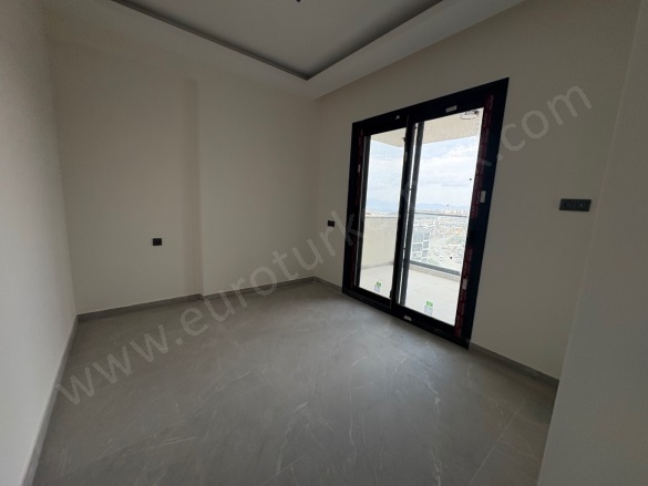 Değirmendere Mah. Kuşadası Satılık Daire |  2+1 Oda | 85M2 7.750.000Tl | 3. Kat | Doğalgaz(Kombi) | 2 Banyo | 2 Yatak Odası Resim-5