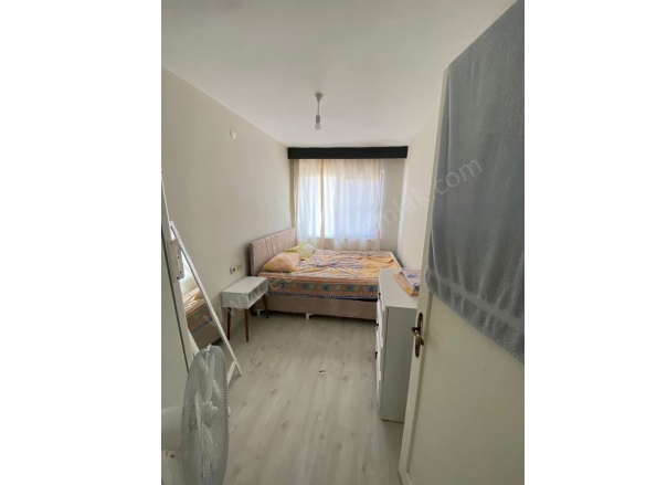 Kadınlar Denizi Mah. Kuşadası Kiralık Daire |  2+1 Oda |Aylık 25.000Tl Eşyalı  | 4. Kat | Klima | 1 Banyo | 1 Yatak Odası Resim-3
