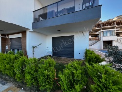 Kuşadası Değirmendere Mah. Satılık Daire 2+1 110 M2 | Bahçe Katı | Yerden Isıtma | 1 Banyo | 2 Yatak Odası