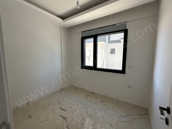 Karaburun Ortaca Satılık Daire |  2+1 Oda | 55M2 3.400.000Tl | Yüksek Giriş | Klima | 1 Banyo | 2 Yatak Odası Resim-4