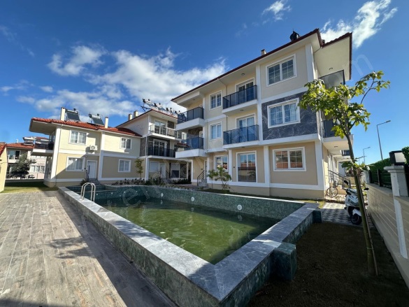 Cumhuriyet Ortaca Satılık Daire |  2+1 Oda | 80M2 4.300.000Tl | Zemin Kat | Güneş Enerjisi | 1 Banyo | 2 Yatak Odası Resim-1