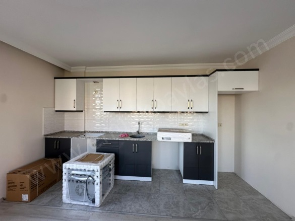 Karaburun Ortaca Kiralık Daire |  2+1 Oda | 75M2 Aylık 20.000Tl | Giriş Katı | Klima | 1 Banyo | 2 Yatak Odası Resim-2