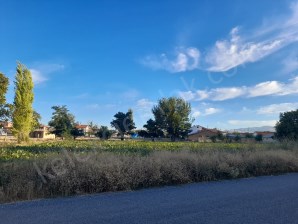 AKCANDAN AĞILÖNÜNE GİDEN YOLDA BATI CEPHELİ ARSA