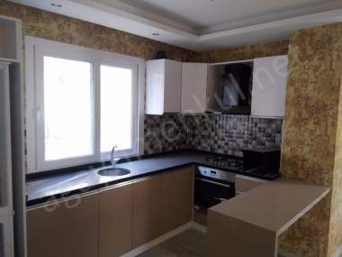 MEZİTLİ'DE İHTİYAÇTAN ACİL SATILIK BEYAZ EŞYALI GENİŞ 1+1 LÜX DAİRE 