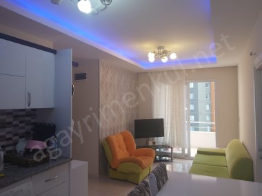 Üniversiye Caddesinde 1+1 Eşyalı Kiracılı Yatırımlık Daire