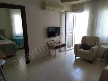 Üniversite Caddesinde İyi Konumlu Site İçinde 1+1 Eşyalı Satılık Daire