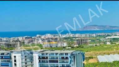 Alanya Mahmutlarda dağ ve deniz manzaralı 1+1 satılık daire