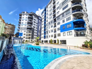 ZU VERKAUFEN: LUXUS 2+1 APARTMENTS IN KONAK TWIN TOWERS, ALANYA ZENTRUM WOHNEN AM KLEOPATRA STRAND