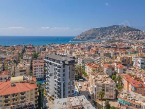ZU VERKAUFEN IN ALANYA – STILVOLLES 2+1 APARTMENT IN SEDA TOWER, NUR 400M BIS ZUM MEER