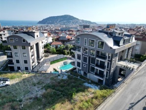 Alanyada Satılık Lüks 4+1 Daire – Deniz Manzaralı, Havuzlu ve Sosyal Donatılı