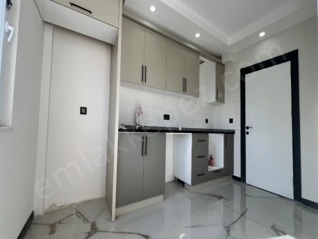 ANTALYA KEPEZ VARSAK AYDOĞMUŞ MAHALLESİNDE DÜKKAN ÜSTÜ SATILIK SIFIR 2+1 DAİRELER