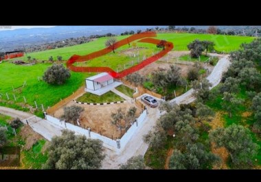 İzmir  Torbalı, Dilmil köyünde, (419,70 x 2 ) 839.40 m² bahçe.