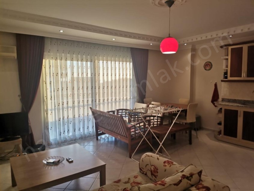 ALANYA MAHMUTLAR GÖLEVİZ MEVKİİNDE HAVUZLU SİTEDE 2+1 AÇIK MUTFAK EŞYALI SATILIK DAİRE