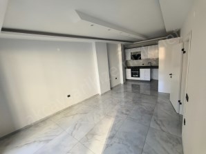 SIFIR 2+1 DAİRE  TUZCUMURAT MAHALLESİNDE DOĞALGAZLI AÇIK MUTFAKLI
