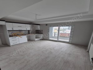 TURGUTLU SATILIK ŞEHİTLER MAH 1+1 ODA 75M2 ASFALT CEPHELİ SIFIR ASANSÖRLÜ DOĞALGAZLI DAİRE 