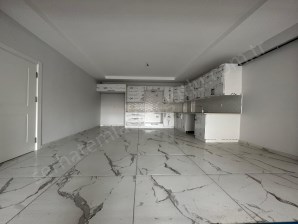 TURGUTLU SATILIK İSTİKLAL MAH 170M2 3+1 ODA DÜKKAN ÜSTÜ SIFIR DAİRE 