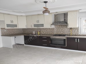 TURGUTLU KİRALIK ERGENEKON MAH 3+1 ODA ZEMİN KAT BALKONLU DOĞALGAZLI 125M2 NET KULLANIM