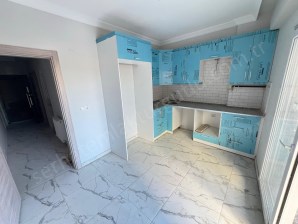 TURGUTLU SATILIK YİĞİTLER MAH 90M2 NET 50M2 KENDİNE AİT BAHÇE 2+1 DOĞALGAZLI SIFIR DAİRE ZEMİN KAT