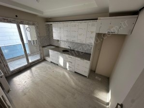 Turgutlu satılık şehitler mah 100m2 2+1 oda 3. ara kat asansörlü otoparklı doğalgazlı balkonlu sıfır