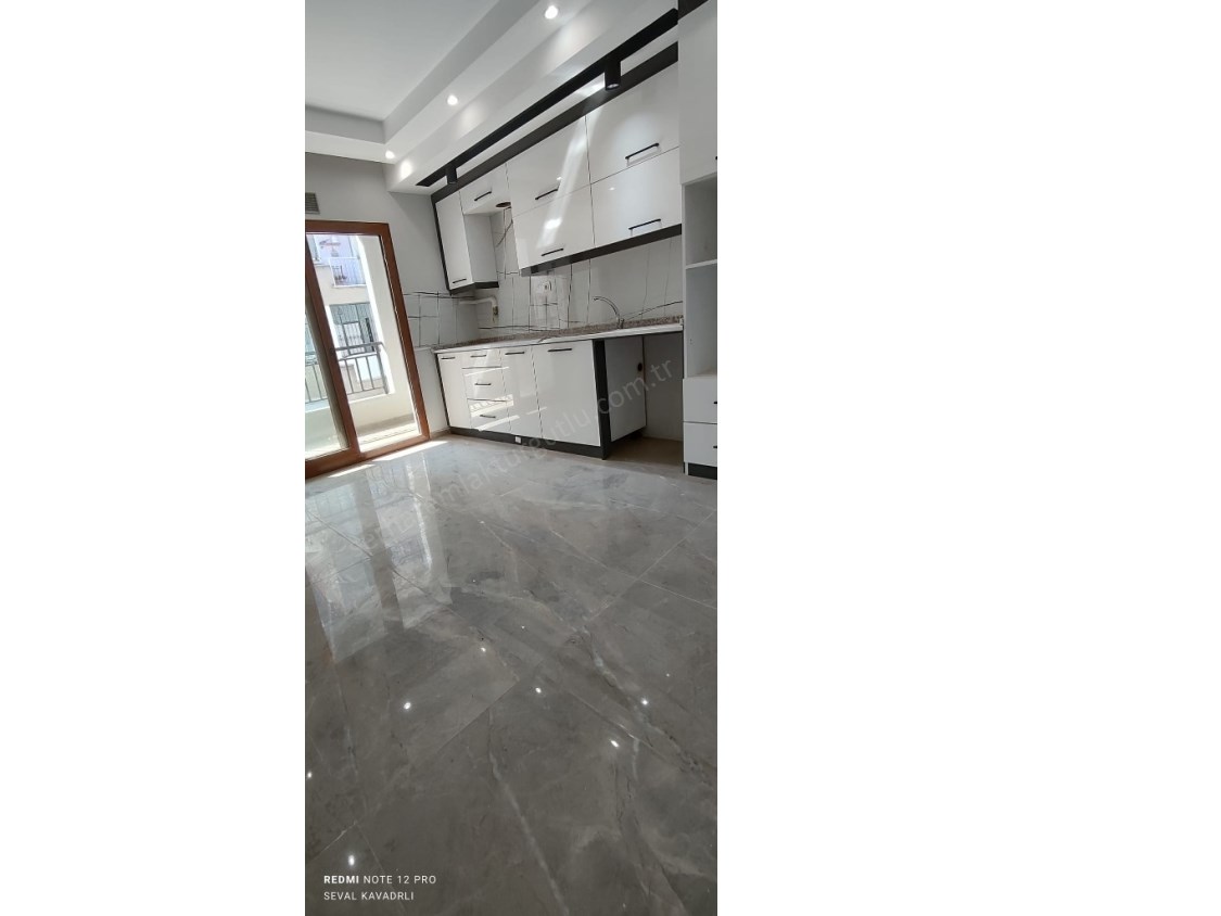 TURGUTLU SATILIK ÖZYURT MAH 2+1 ODA 115M2 DOĞALGAZLI OTOPARKLI ÇİFT BALKON ZEMİN ÜSTÜ 1. KAT DAİRE 