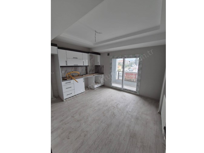 TURGUTLU SATILIK ŞEHİTLER MAH 1+1 ODA 75M2 ASFALT CEPHELİ SIFIR ASANSÖRLÜ DOĞALGAZLI DAİRE 