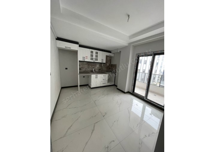 TURGUTLU SATILIK ERGENEKON MAH 2+1 ODA 110M2 ZEMİN ÜSTÜ  OTOPARKLI ASANSÖRLÜ YERDEN ISITMA SIFIR D.