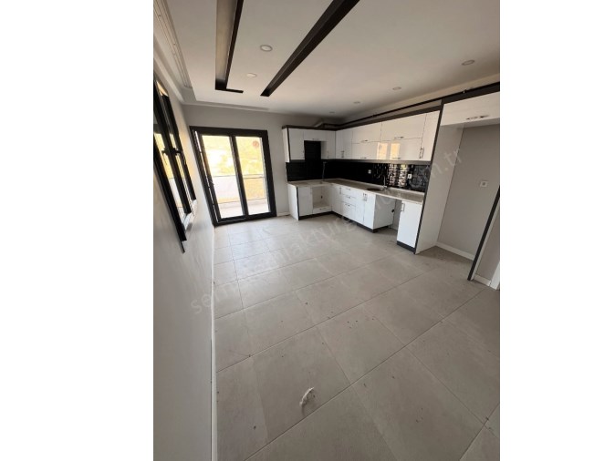 TURGUTLU KİRALIK ERGENEKON MAH 130M2 3+1 ODA 4. KAT ASANSÖRLÜ YERDEN ISITMA OTOPARKLI BALKONLU SIFIR