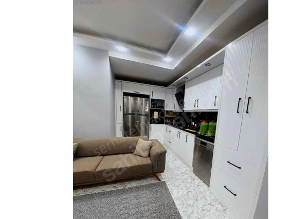 TURGUTLU SATILIK CUMHURİYET MAH HEYKELLER CİVARI 110M2 3+1 OTOPARK ÜSTÜ 2 YILLIK DAİRE 