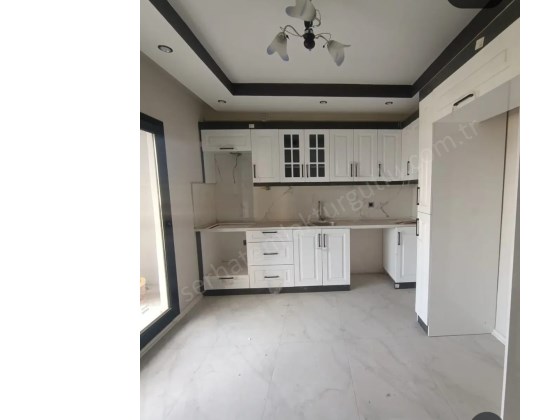 TURGUTLU KİRALIK YENİ MAH 110M2 2+1 ODA 2. KAT YERDEN ISITMA ASANSÖR CAM BALKONLU SIFIR DAİRE 