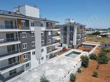 ANTALYA DEMİRELDE HAVUZLU SİTE İÇİ 1+1 KATTA SATILIK DAİRE