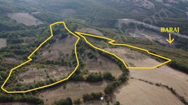 SUÇIKTIDA MUHTEŞEM MANZARALI EKO TURİZME UYGUN 83 DÖNÜM TARLA