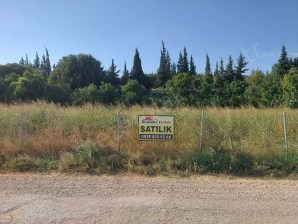 BURSA İSMETİYEDE SATILIK OTOBANA ÇOK YAKIN BOYDANBOYA KADASTRAL YOLA CEPHELİ 8300m2 TARLA