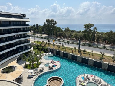 NOW REDUCED! 1ST SEA LINE IN KARGICAK/ALANYA – EXCLUSIVE LUXURY CORNER APARTMENT WITH PANORAMIC TERR