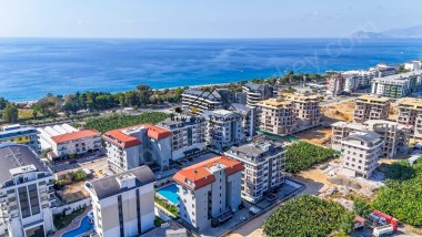 BARGAINS BY THE SEA! 2-BEDROOM APARTMENT JUST 100 M  THE BEACH – KARGICAK/ALANYA