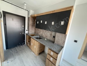 YENİ BELEDİYE YAKININDA 2+1 AMERİKAN MUTFAKLI SATILIK APART APART