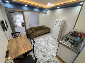 ÜNALAN MAHALLESİ ŞAHİN MARKET 1+1 KİRALIK EŞYALI APART DAİRE