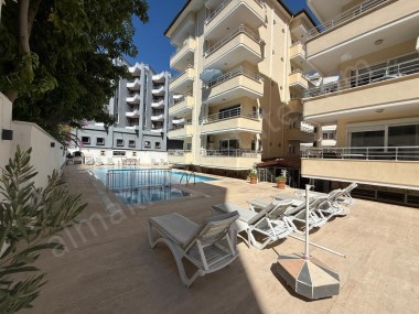 ALANYA DA SATILIK DAİRE OBA MAHALESİ 1+1 HAVUZLU YENİ BİNA 2025