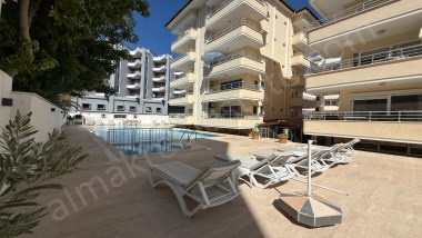 ALANYA DA SATILIK DAİRE OBA MAHALESİ 1+1 HAVUZLU YENİ BİNA 2025