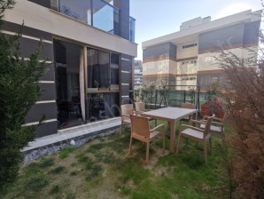 Değirmendere mevkisinde yüzme havuzlu site içinde satılık doğalgazlı geniş bahçe katlı dairemiz vuk