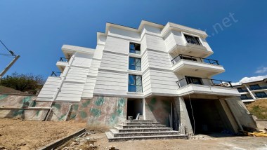 ▶ ▶AKÇAY KÖRFEZDEN HAVUZLU KAPALI OTOPARKLI GENİŞ TERASLI 1+1 DUBLEKS DAİRE